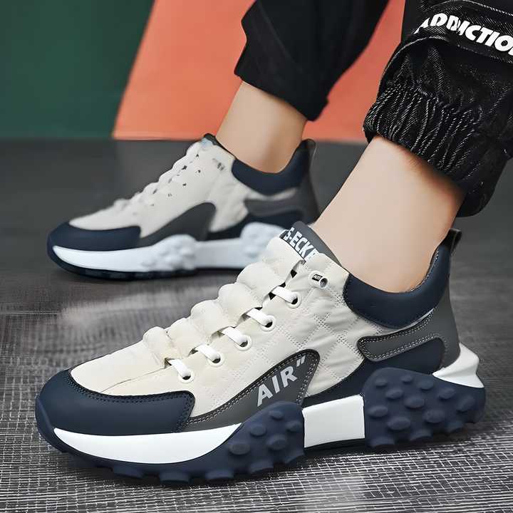 Men's white casual thick base sneakers with lace-up closure and rubber sole"