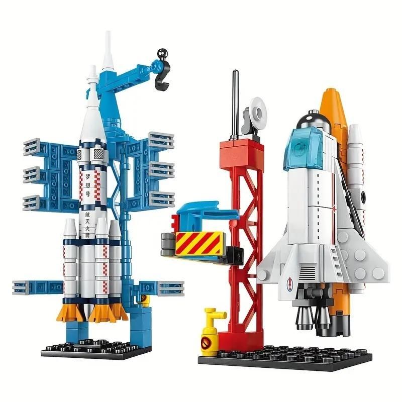 Toy model rockets and launch platforms assembled from building blocks.
