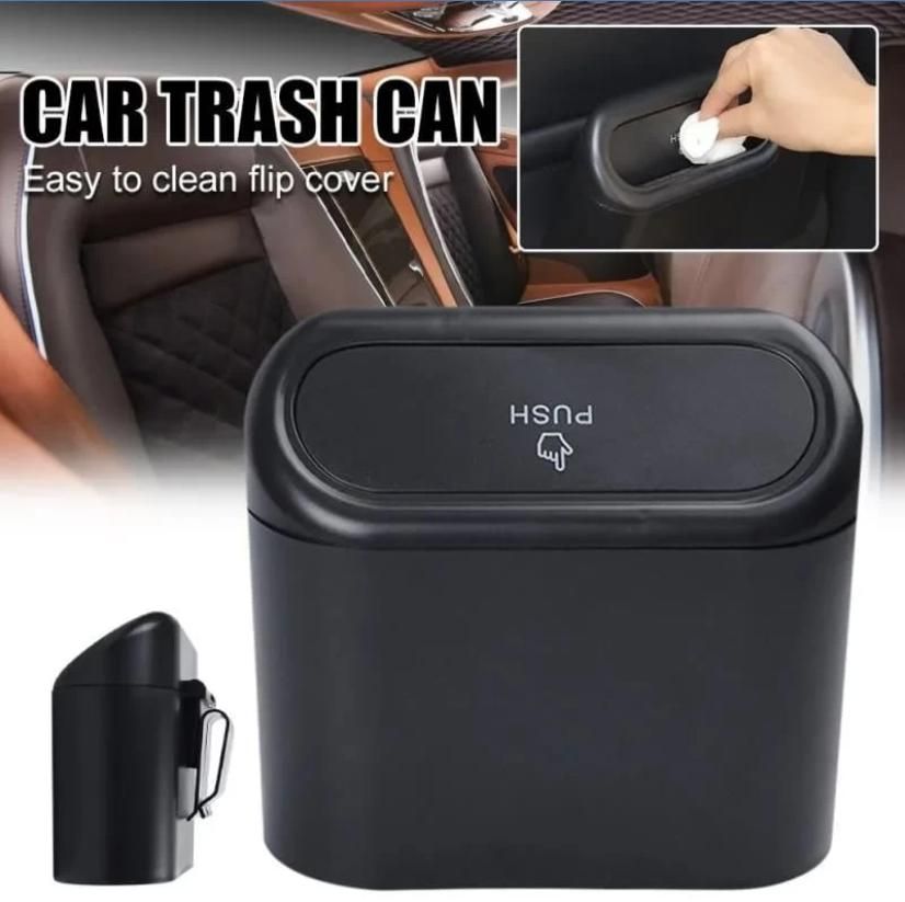 Mini Car Trash Bin - Portable and waterproof black dustbin for car interiors.






