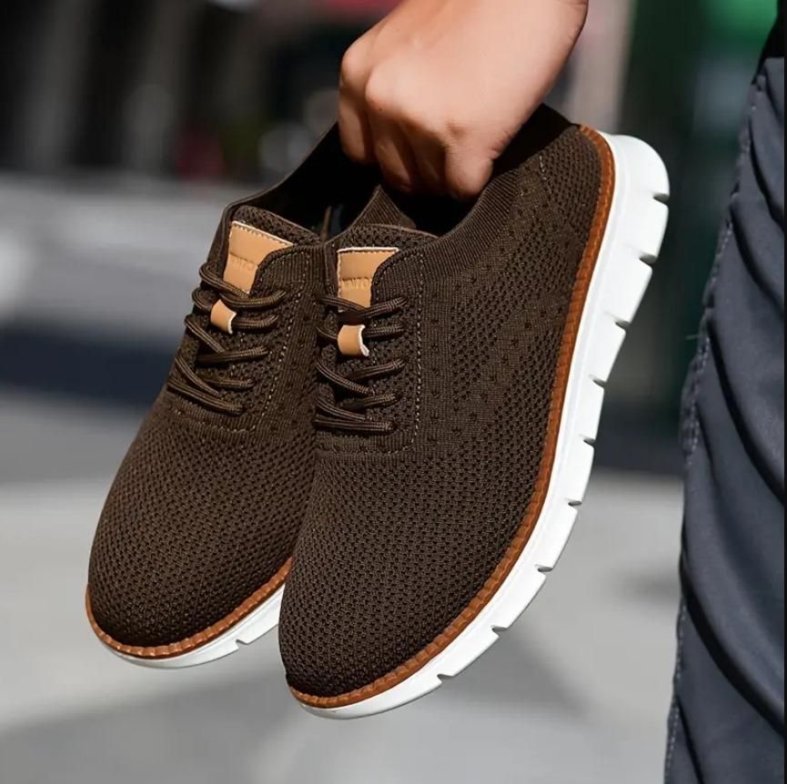 Men's brown casual shoes with mesh outer material and rubber sole, perfect for everyday wear.