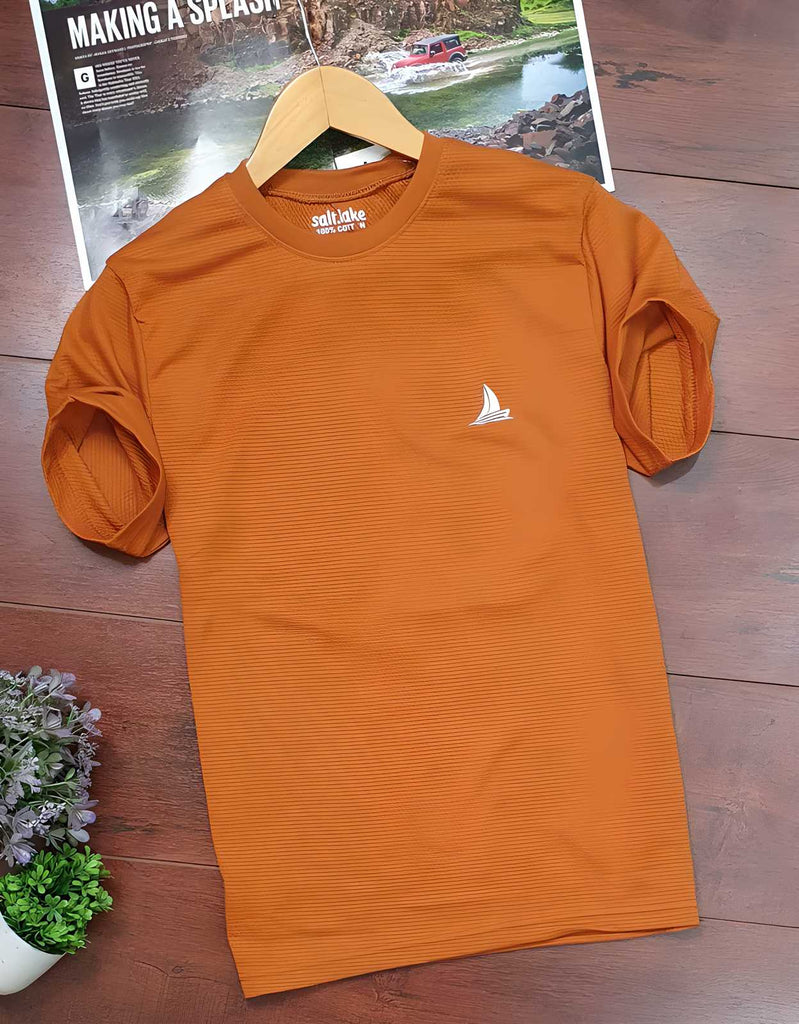 Orange men's cotton t-shirt with solid pattern, half sleeves, and cowl neck design.