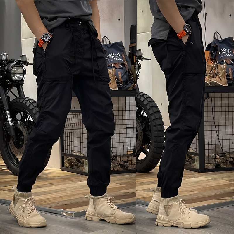 Men's black cotton cargo pants jogger with elastic waistband and multiple pockets, ideal for casual wear.