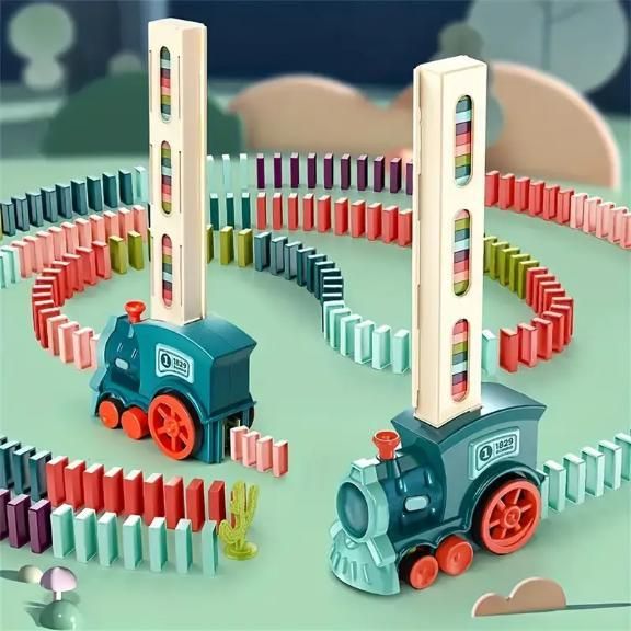 Two toy trains with tall stacks on top are surrounded by colorful dominoes arranged in circular patterns.