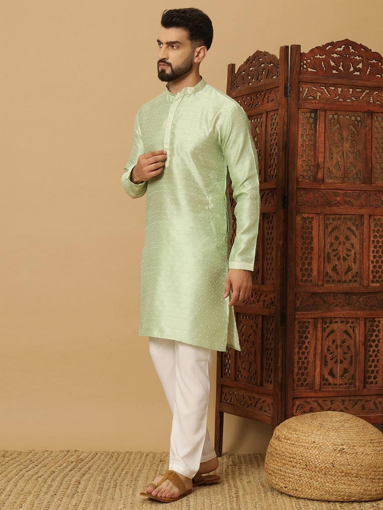 Men's light green Jacquard kurta pyjama set with mandarin collar and full sleeves, perfect for festive and ethnic occasions.