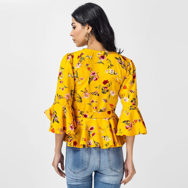 Back view of Oceanista Womens Crepe Floral Print Mustard Top, displaying the full print and back design