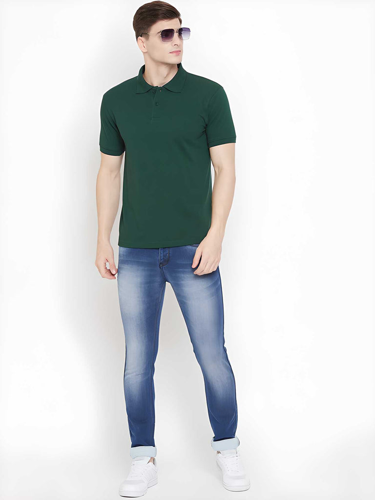 Men's green cotton blend polo T-shirt by KETEX with a solid pattern, half sleeves, and regular fit, perfect for casual wear.