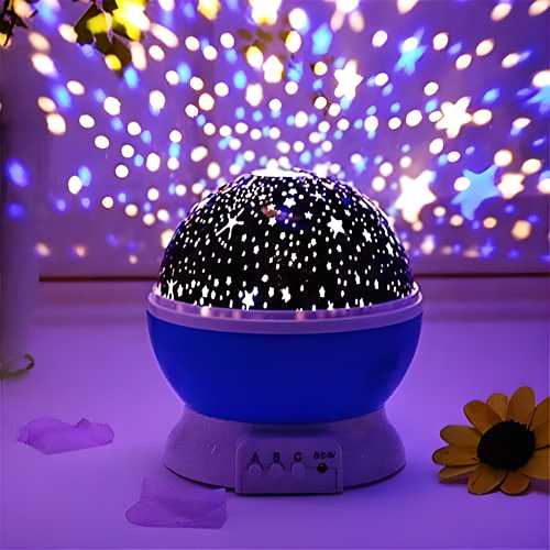 "Star Master rotating moon night light lamp projector with colorful lights for kids"






