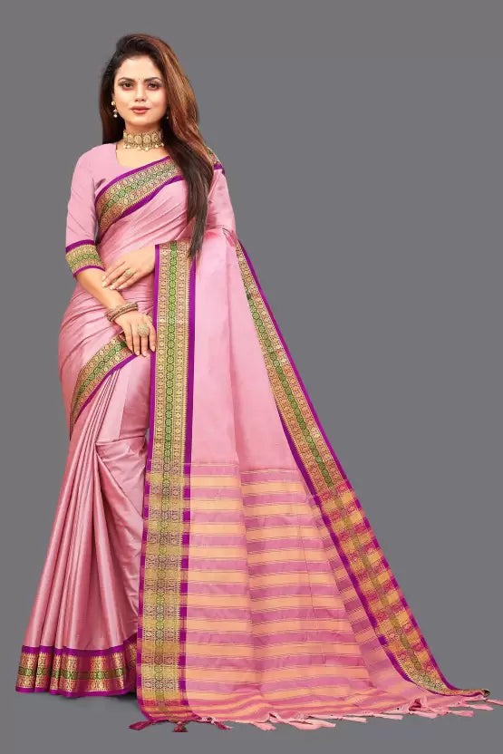 Unique Aura Silk Solid Saree featuring a luxurious solid-colored fabric with a shimmering zari border. The saree measures 6.5 meters in length and includes an unstitched matching blouse piece. Perfect for weddings, festivals, and special occasions, offering a blend of traditional craftsmanship and modern sophistication