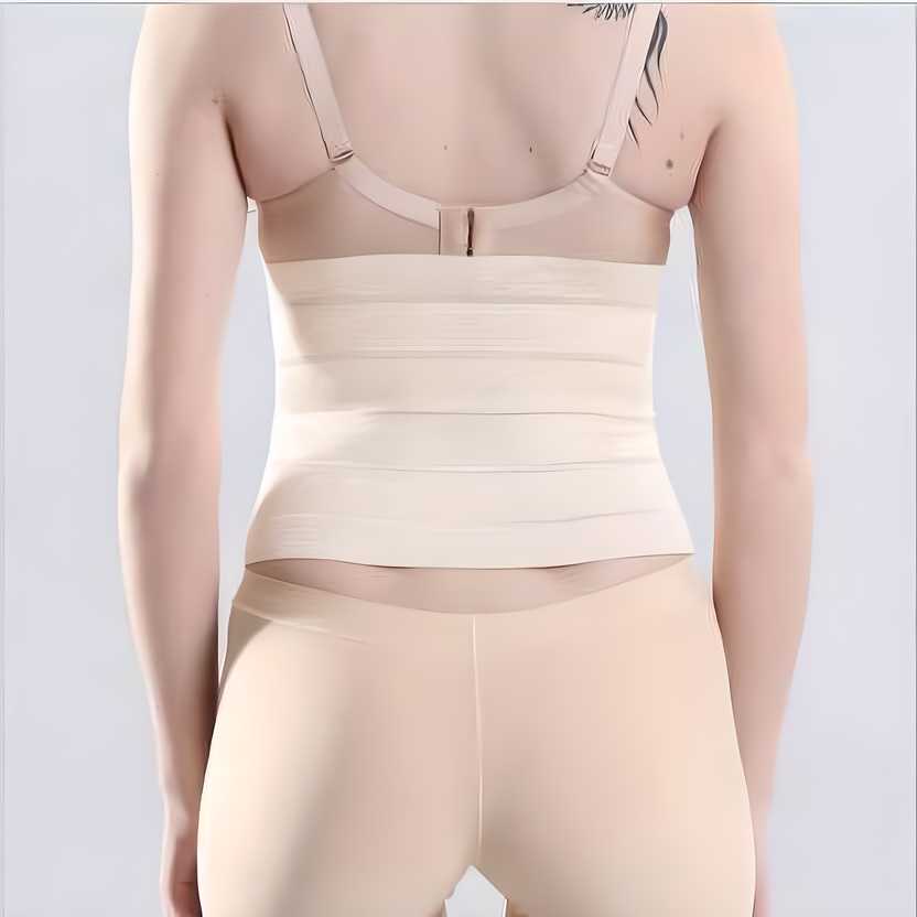 Women's waist trainer corset with steel boning, adjustable hooks, and belt, made from cotton for tummy control and everyday wear.
