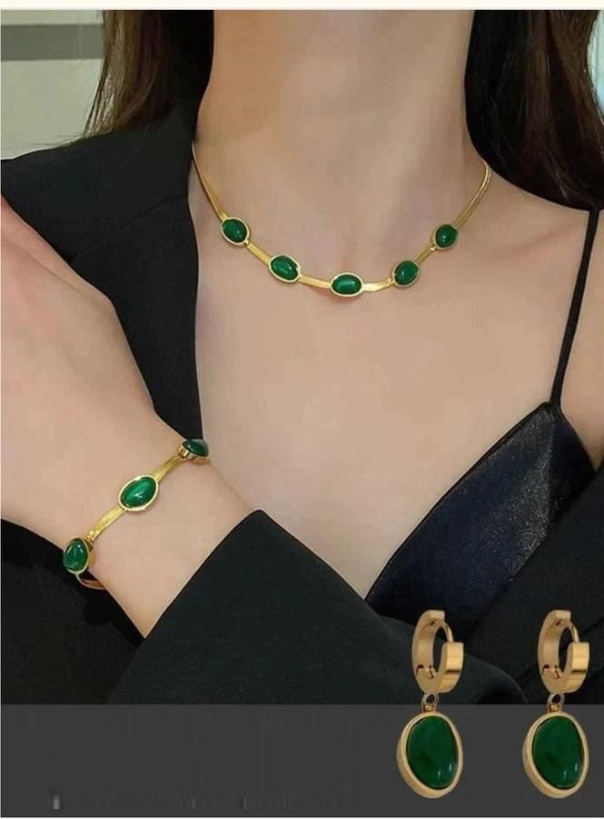 Elegant Oval Green Crystal Pendant Necklace Set with matching Bracelet, featuring a captivating green crystal pendant on an 18-inch necklace and an adjustable bracelet. The set includes high-quality metal with options in gold or silver, designed to add a touch of sophistication and glamour to any outfit.