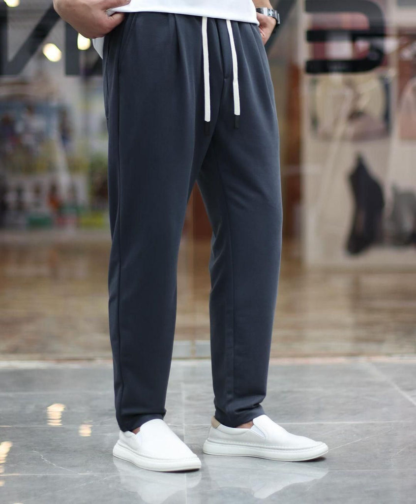 "Men's navy blue solid Taiwan fabric drawstring track pants"






