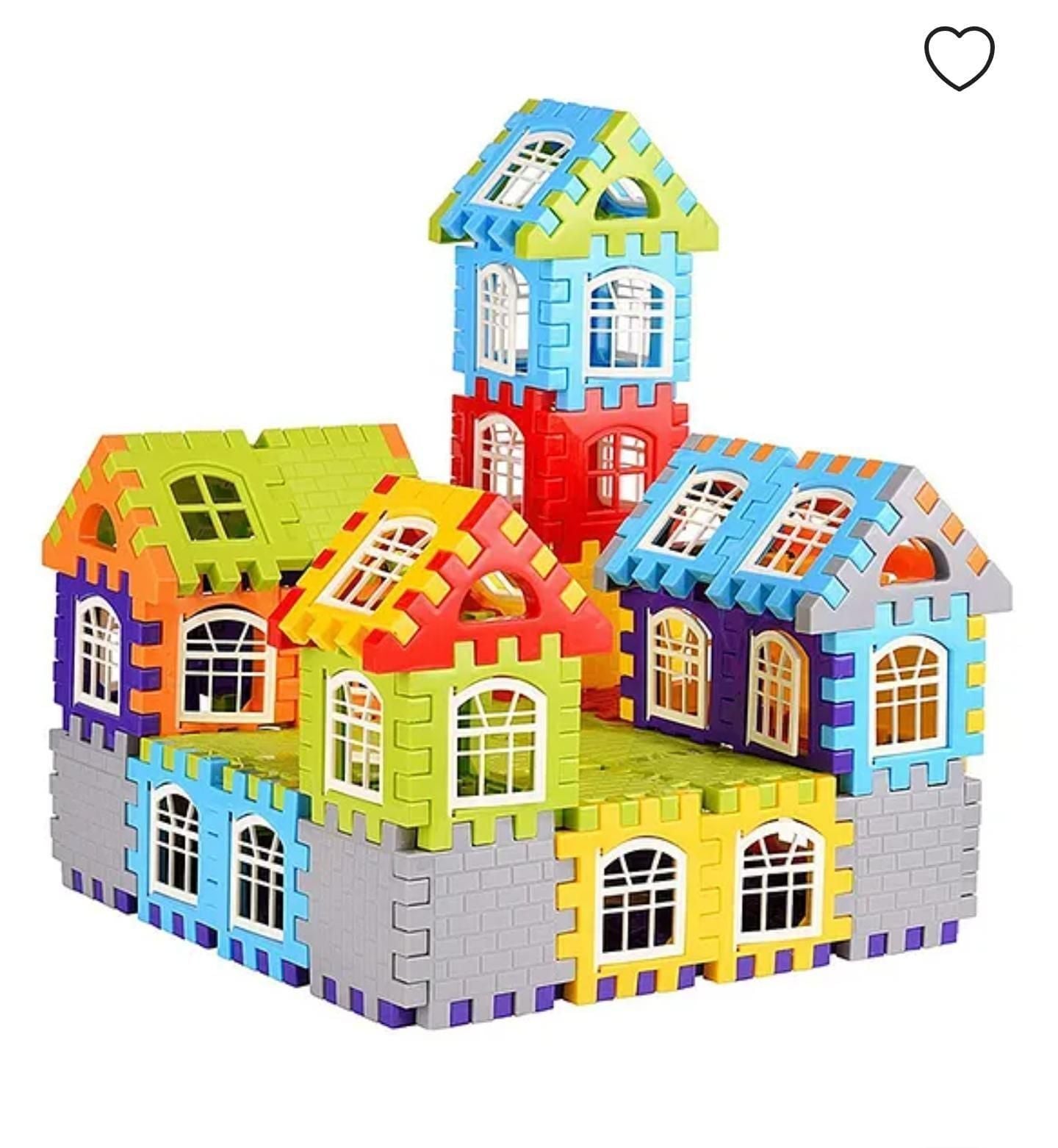A colorful toy house constructed from interlocking plastic building bricks with window designs.