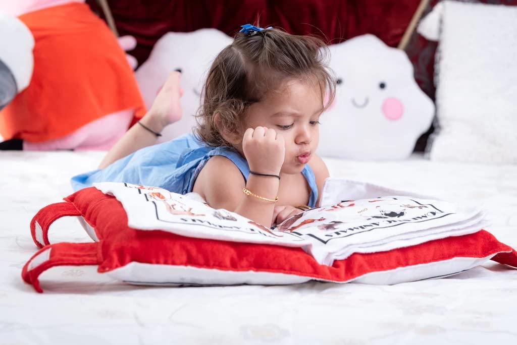 Soft baby learning cushion pillow book featuring colorful, interactive pages designed to engage and educate infants