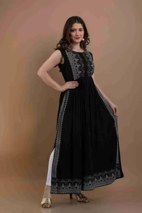 Chic OCEANISTA Women's Black Rayon Long Kurti featuring a printed design, perfect for casual occasions. This sleeveless, long-length kurti is pre-stitched for ease of wear.