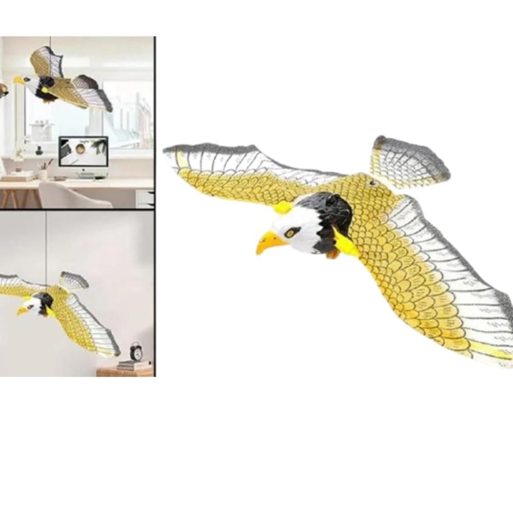 A hanging decorative model of a bald eagle with yellow wings and a white head, shown in a home office setting.