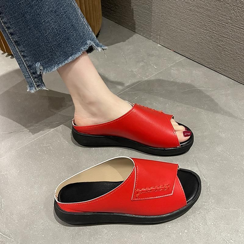 Flat Sandals for Women featuring a breathable design, perfect for summer. These fashion-forward slip-ons come in various colors, offering a lightweight and comfortable fit. Ideal for casual outings, beach days, and warm-weather occasions.