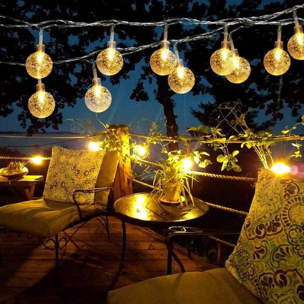 Warm yellow 16 LED crystal balls string light, 3.5m length, perfect for festive and home decorations.

