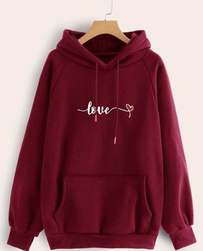 Womens Fleece Printed Hoodie featuring a cozy hood, front pockets, and eye-catching prints, made from soft fleece for warmth and comfort.