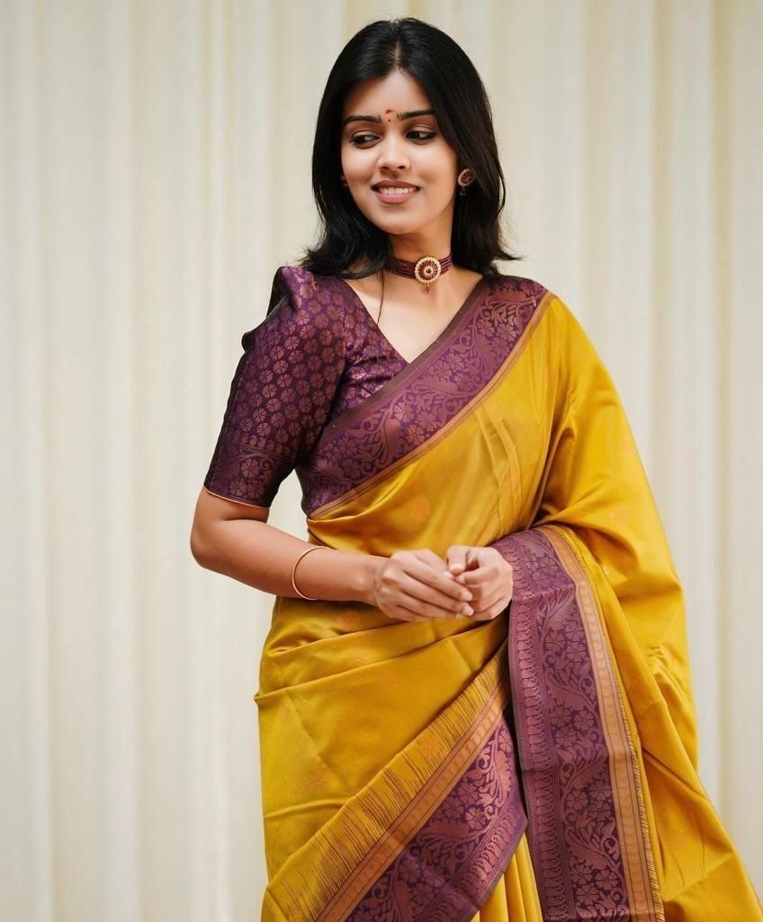 Elegant Women's Yellow Jacquard Silk Saree with Floral Patterns, ideal for weddings and festive occasions. Comes with an unstitched Jacquard Silk blouse piece. Saree length is 5.5 meters, and the blouse piece is 0.8 meters.