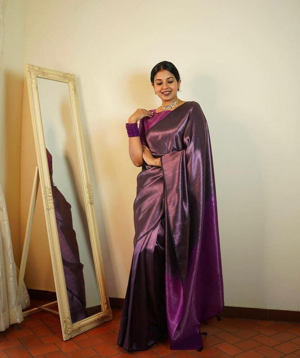 Elegant Women's Purple Jacquard Saree, specially designed for weddings. Features solid color with intricate Jacquard work. Comes with an unstitched Jacquard blouse piece. Saree length is 5.5 meters, and the blouse piece is 0.8 meters.