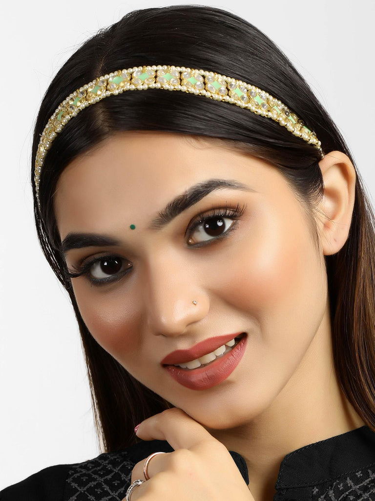 Eye catching Karatcart gold Plated Lime Green Meena Kundan Hairband, featuring intricate Meena Kundan detailing with vibrant lime green enamel set on a gold-plated base. This elegant hair accessory is designed to add a touch of sophistication to any outfit, perfect for weddings, parties, and festive occasions.